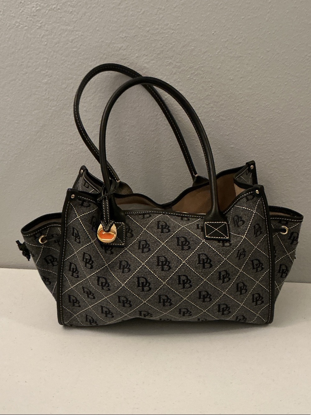 Dooney & Bourke Black Logo-Print Satchel with Gold Accent